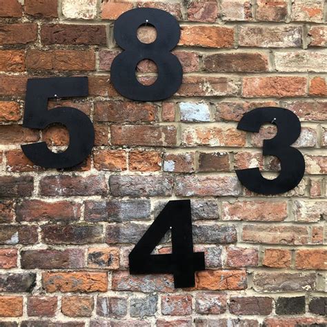 house number black metal sign under $40|black metal house number ideas.